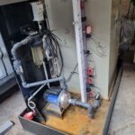 Cuve de traitement avec bac de rétention